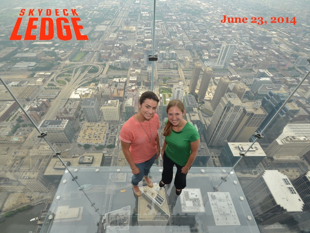 Lauren and photographer Jessica experiencing the Skydeck. Credit: Skydeck Chicago